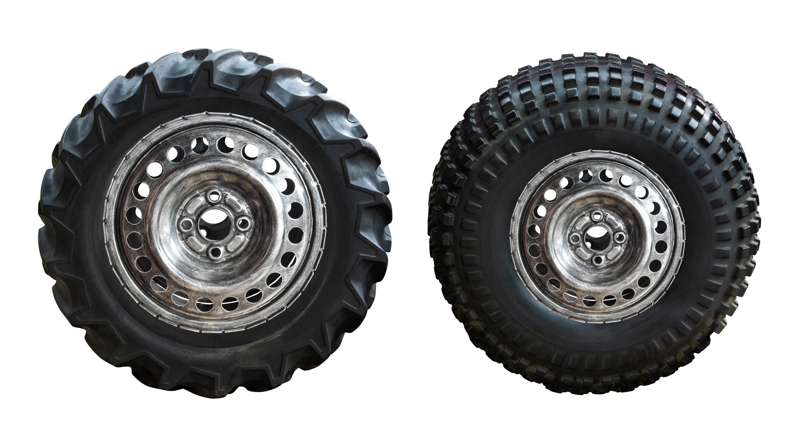 Close-up comparison of factory highway tyres vs all-terrain tyres side by side